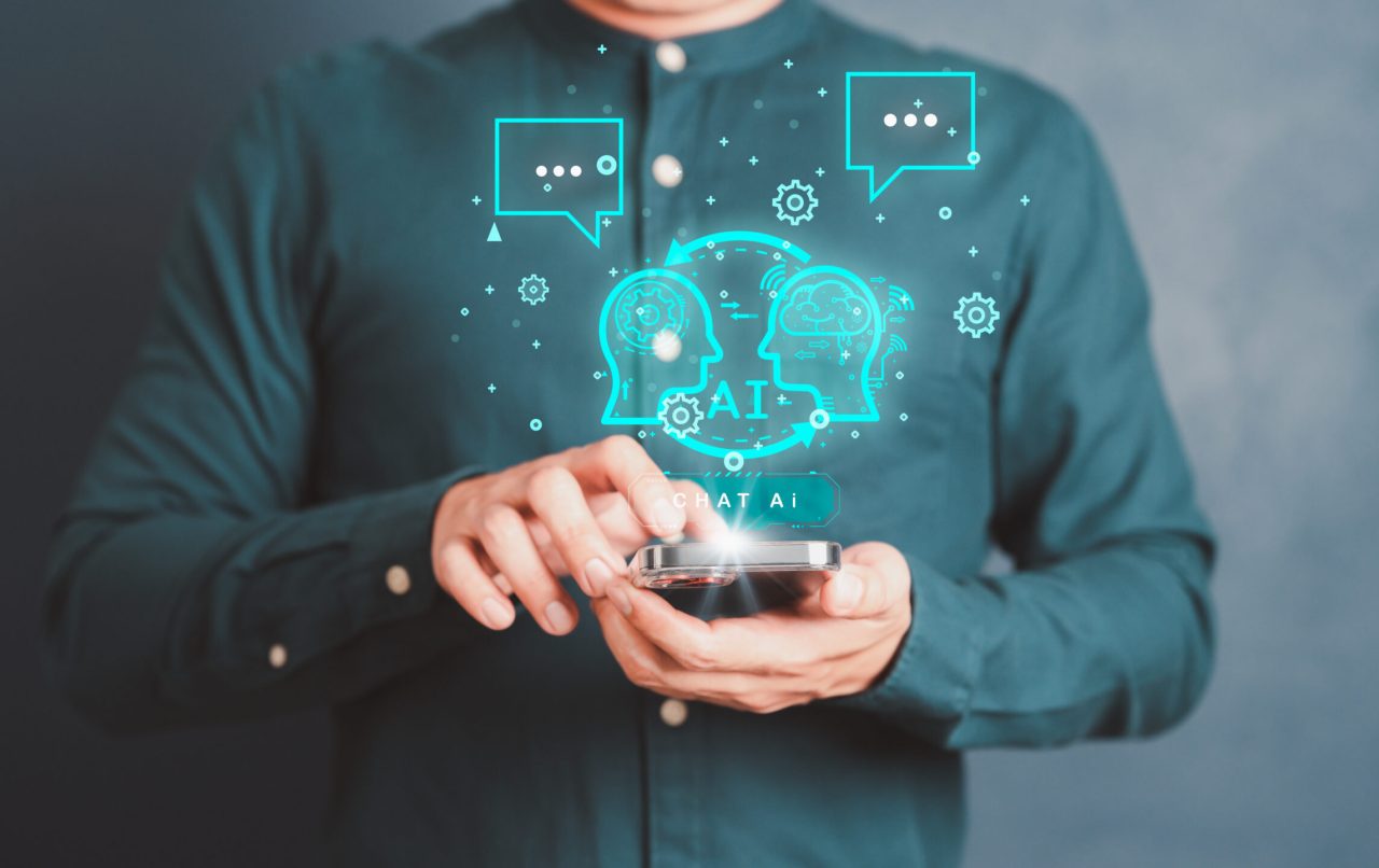 ChatGPT Chat with AI, Artificial Intelligence. Adult man chatting with a smart AI or artificial intelligence using an artificial intelligence chatbot developed, Futuristic technology transformation.